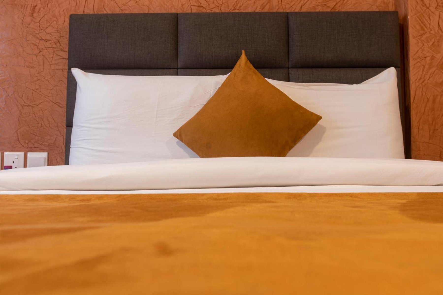 Close-up of the king bed in the Executive Plus Suite